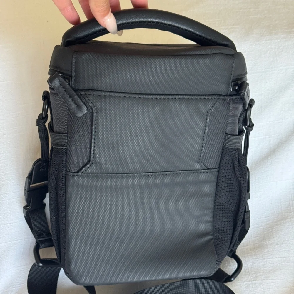 DJI Mavic Black Messenger Bag with Adjustable Strap and Minimalist Design